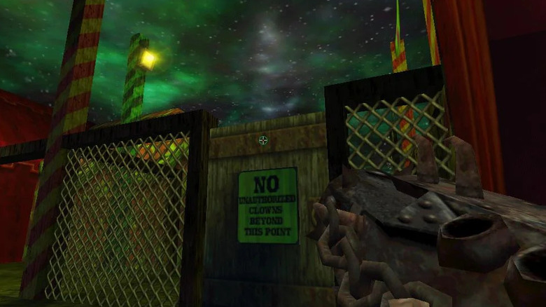 The player approaches a large gate in "Kiss: Psycho Circus — The Nightmare Child" (2000)