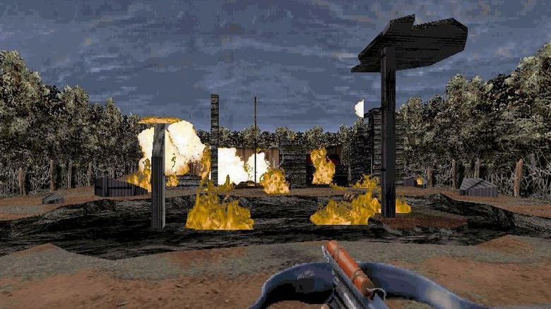 Leonard approaches a burning structure with a dynamite-loaded crossbow in "Redneck Rampage" (1997)