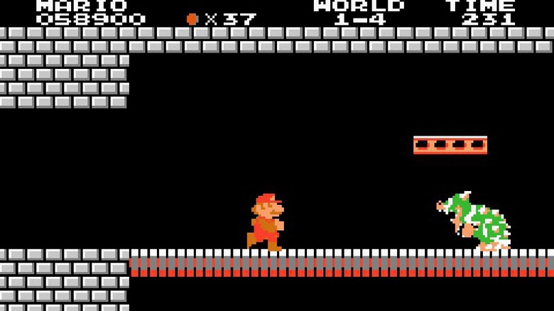 Mario runs at Bowser in Super Mario Bros.
