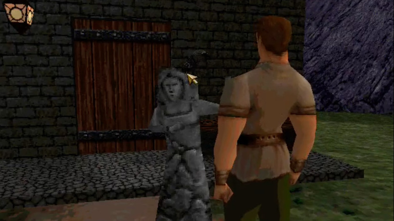 Connor examines a stone statue of Sarah in King's Quest: Mask of Eternity