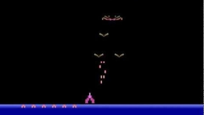 A purple ship dodges lasers from winged enemies in Demon Attack