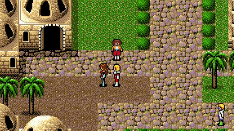 Three characters walk through a desert village together in "Phantasy Star IV: The End of the Millennium" (1993)