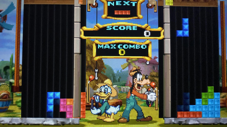 Donald Duck and Goofy control falling blocks in Magical Tetris Challenge