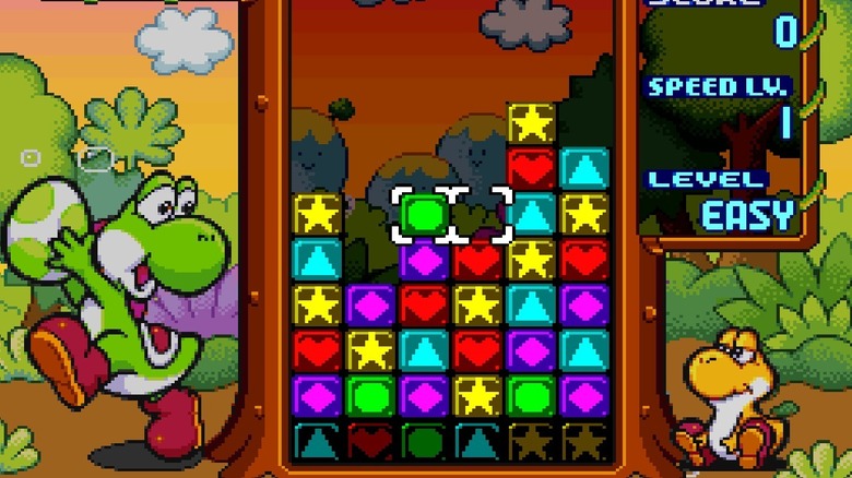Two Yoshis organize colored blocks in Tetris Attack