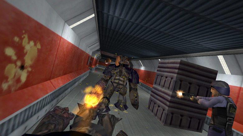 A soldier shoots a mutant with a machine gun arm in Half-Life