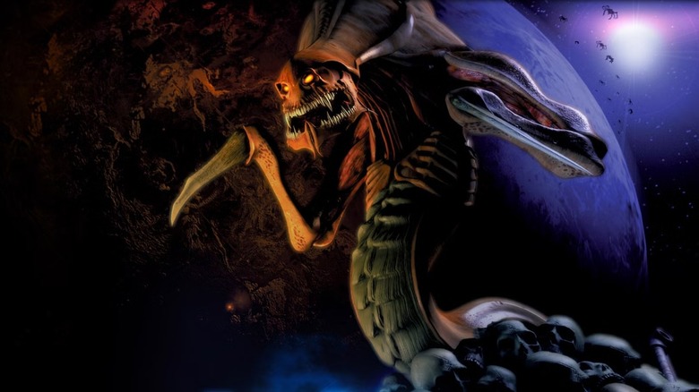 A Zerg snarls on a pile of skulls over a planet in StarCraft