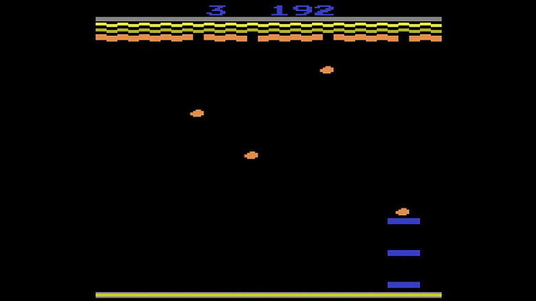 Blue paddles catch orange falling rocks in "Avalanche"