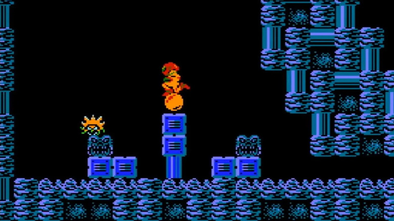 Samus Aran kneels on a Power Ball in Metroid