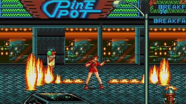Blaze stands in the middle of a fire on the sidewalk in Streets of Rage