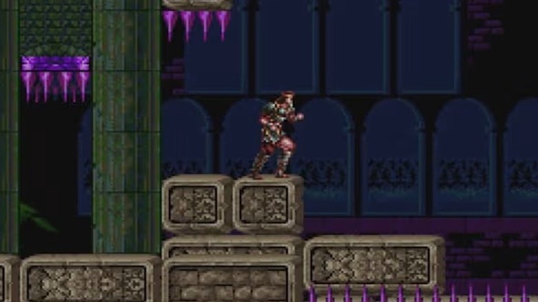 Simon Belmont walks under a set of spikes in Super Castlevania IV