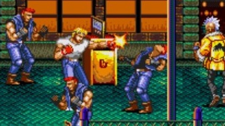 Axel Stone punches a crook in the face in "Streets of Rage 2" (1992)