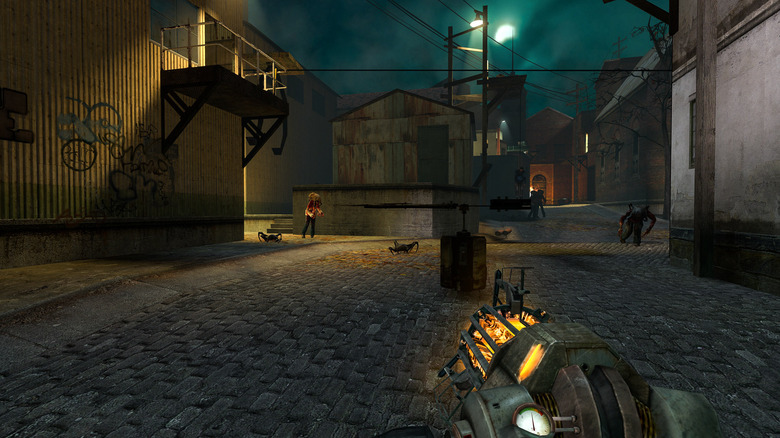 Gordon Freeman approaches zombies with a futuristic gun in Half-Life 2
