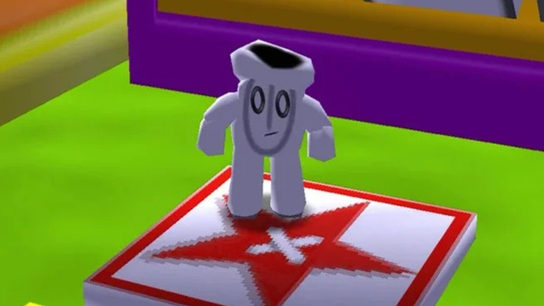 Glover stands on a white platform with a red star in "Glover" (1998)
