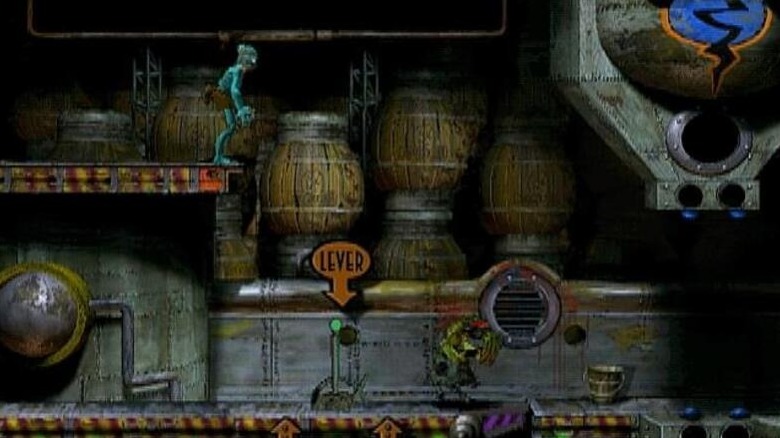 Abe stands above a lever in "Oddworld: Abe's Oddysee" (1997)