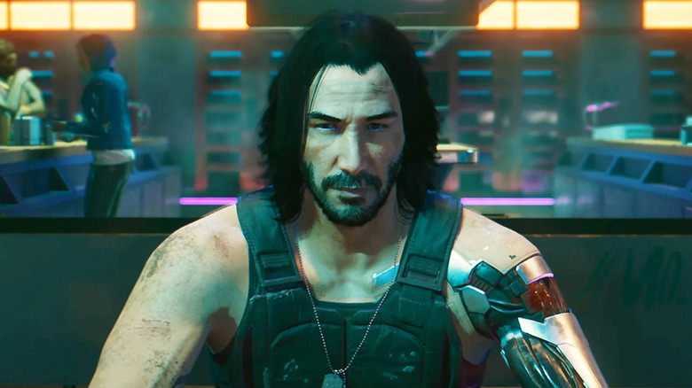 Johnny Silverhand stares at V in "Cyberpunk 2077" (2020)