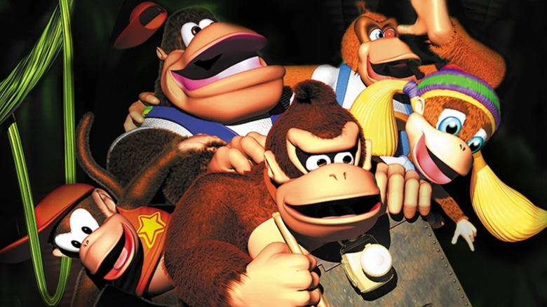 Diddy Kong, Chucky Kong, Lanky Kong, Tiny Kong, and Donkey Kong ride together in a mine cart on the cover art for "Donkey Kong 64"