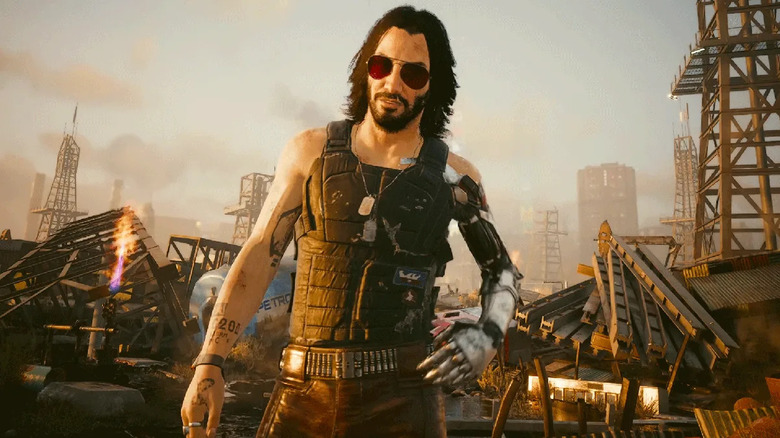 Johnny Silverhand stands with his hand on his hip in Cyberpunk 2077