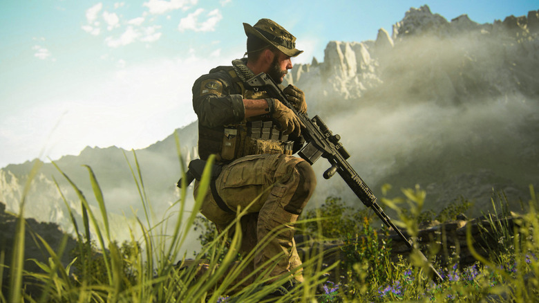Price speaks into his radio while kneeling in Call of Duty: Modern Warfare III (2023)