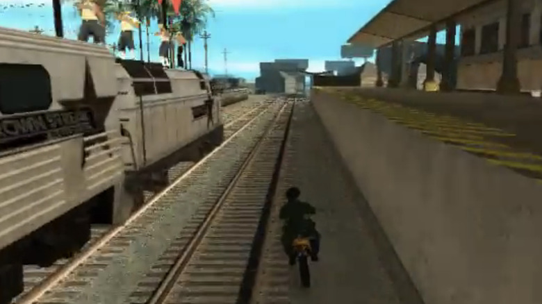 Carl Johnson and Melvin "Big Smoke" Harris ride a dirtbike alongside a train in Grand Theft Auto San Andreas