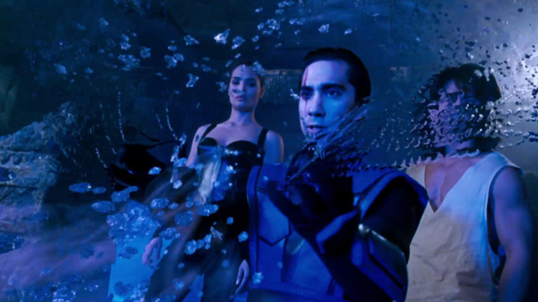 Kitana and Liu Kang watch Sub-Zero manipulate ice in "Mortal Kombat: Annihilation" (1997)