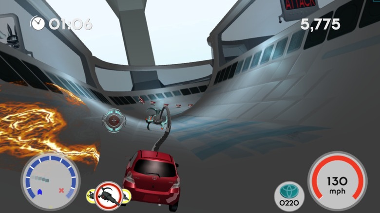 Red car racing in Yaris