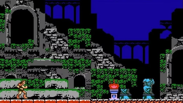 Trevor Belmont walks through an overgrown abandoned castle in "Castlevania III: Dracula's Curse" (1989)