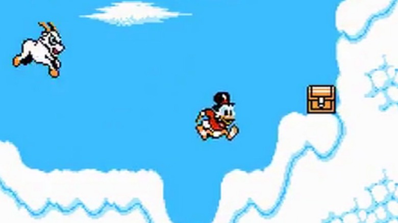 Scrooge McDuck and an angry mountain goat jump towards a treasure chest on a snow mountain in "DuckTales" (1989)