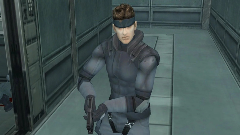 Solid Snake sneaking with his gun out in Metal Gear Solid