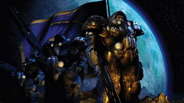 A group of Terran marines stand by a flag overlooking a planet in "StarCraft" (1998)