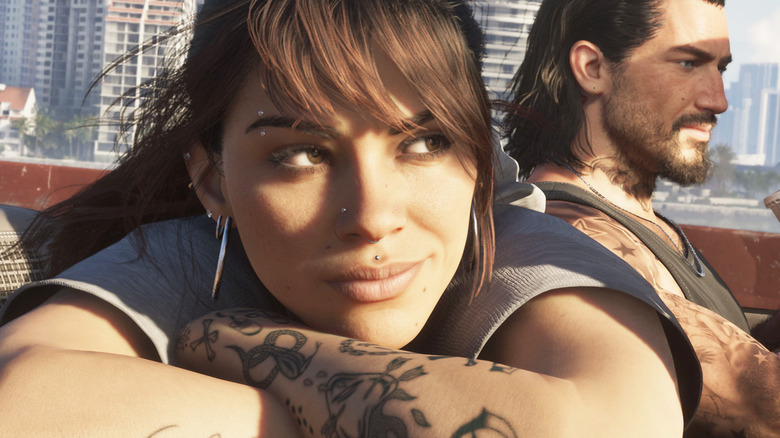 Lucia Caminos leans on the door of a car while Jason Duval drives in Grand Theft Auto 6