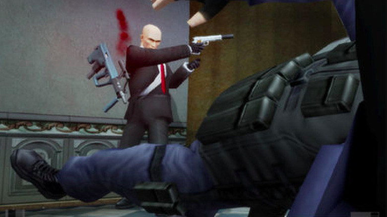 Agent 47 shoots a soldier in Hitman: Contracts
