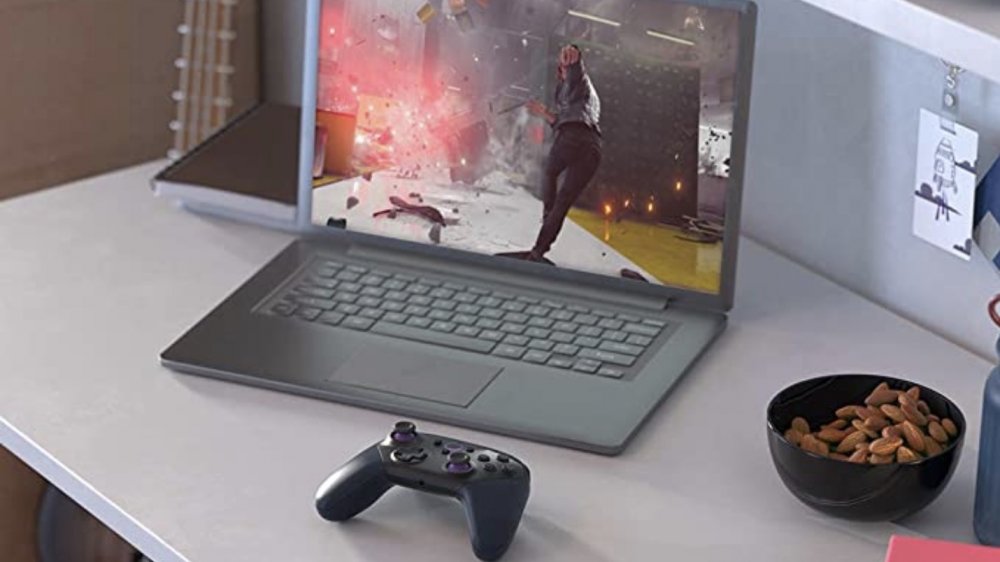 Laptop with Amazon controller on desk