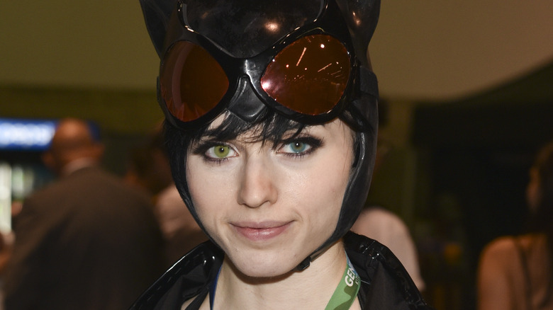 Amouranth cosplaying as Catwoman