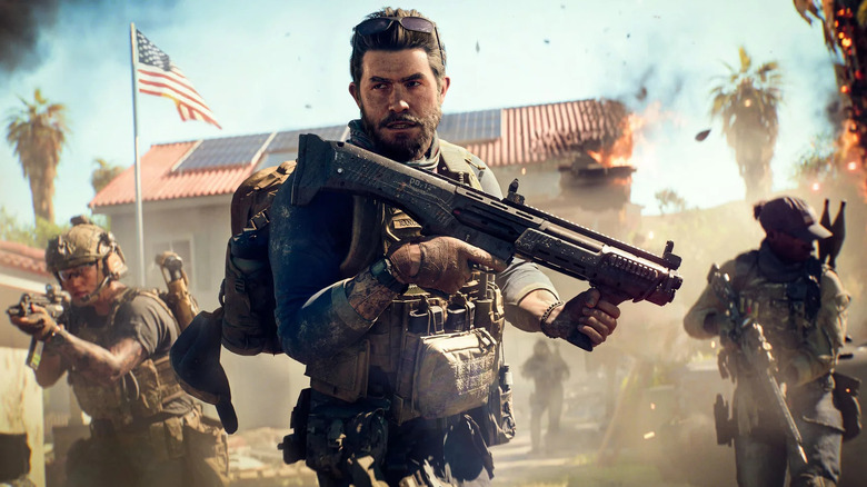 A soldier holds a shotgun while flanked by two squadmates in Battlefield 6