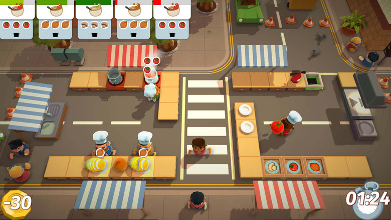 A team of chefs work in a busy kitchen in the middle of a street in "Overcooked" (2016)
