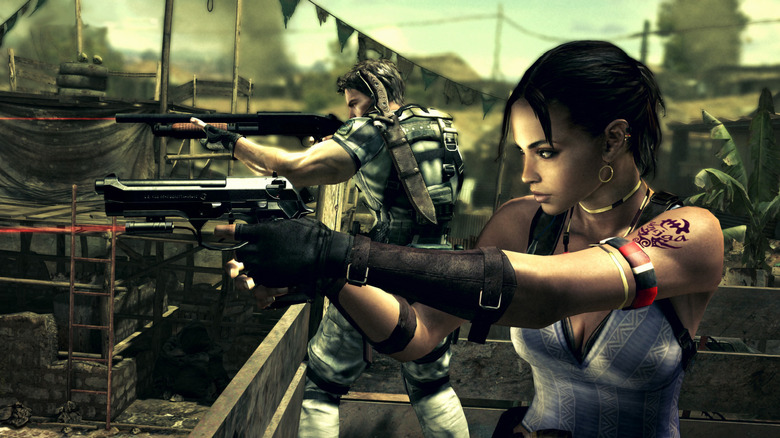 Chris Redfield and Sheva Alomar aim guns from a rooftop in "Resident Evil 5" (2009)
