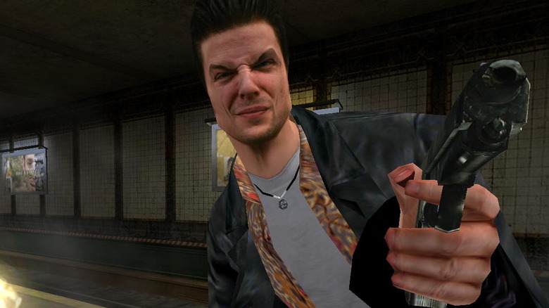 Max Payne grimacing and shooting