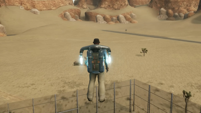 Carl "CJ" Johnson flies across the desert using a jetpack in Grand Theft Auto San Andreas