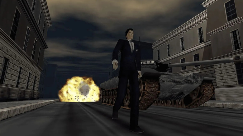 James Bond walks away from an explosion by a parked tank in GoldenEye 007