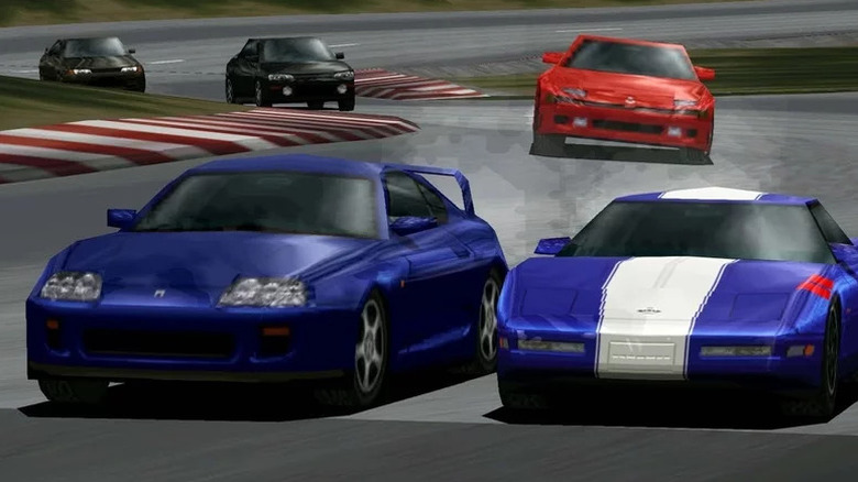 A group of cars in a race in Gran Turismo