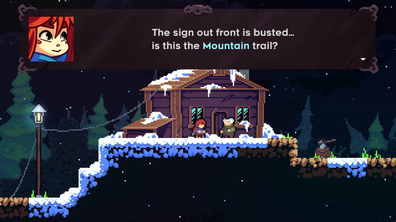 Madeline speaks to an elderly person outside a snowy cabin in Celeste