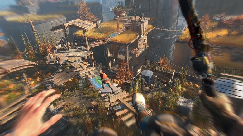 A Dying Light 2 player jumping on an enemy from above