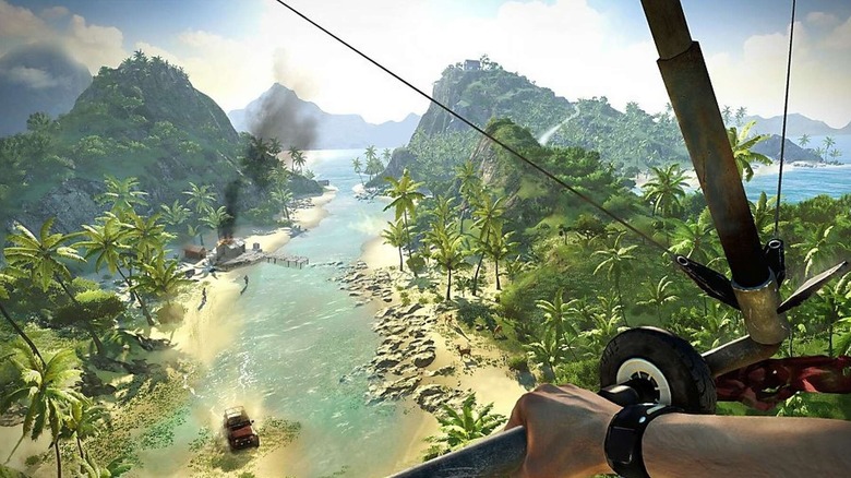 A Far Cry 3 player using a paraglider over a beach