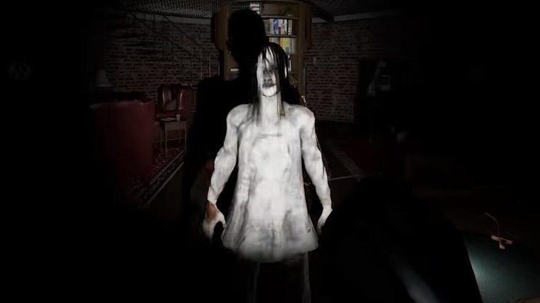 A ghost stands in a dark basement in Phasmophobia