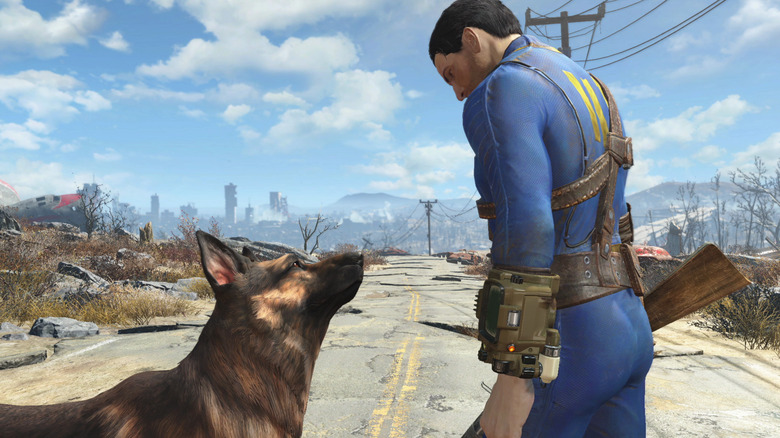 The player character and his dog look at each other on a deserted road in Fallout 4