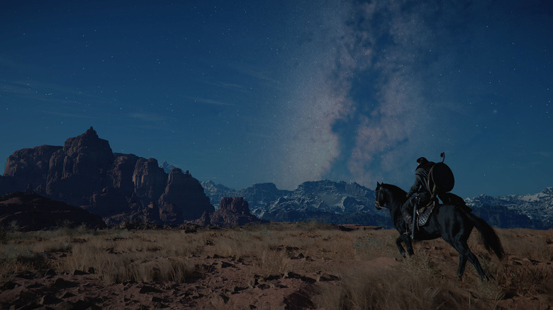 A Crimson Desert player riding through a field on a horse at nighttime