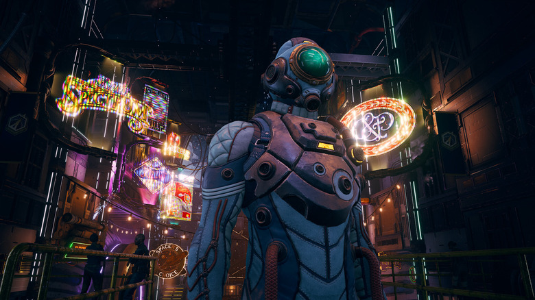An Outer Worlds character standing in front of a well-lit marketplace