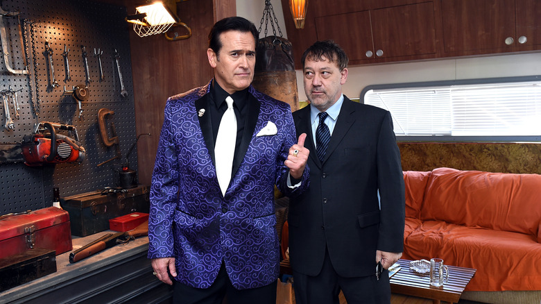 Bruce Campbell and Sam Raimi posing