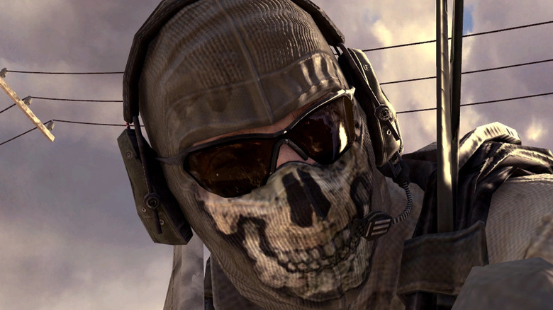 Operator wearing skull mask and headset