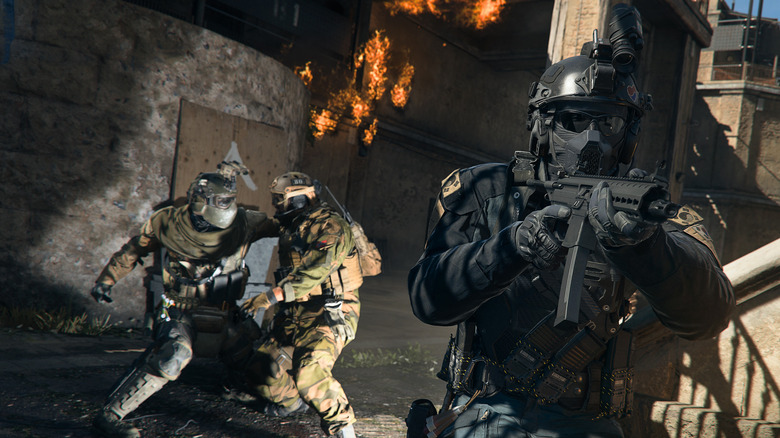 Two soldiers fighting one covering